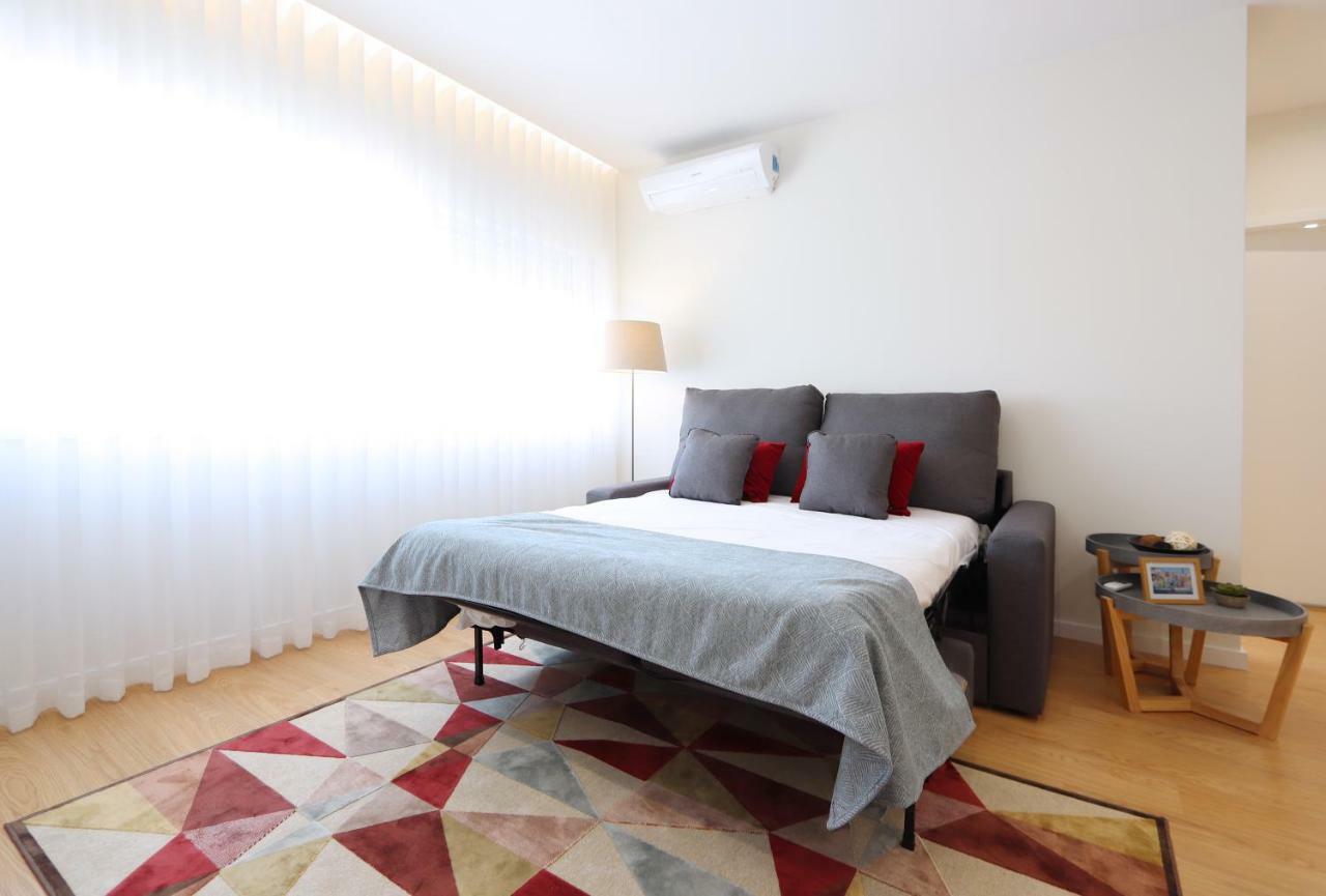 HM - Living Batalha Square 2 Apartment Porto Bagian luar foto