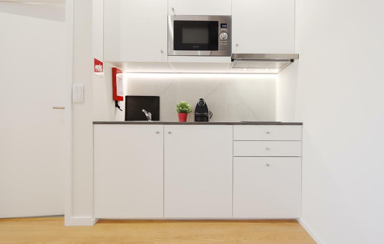 HM - Living Batalha Square 2 Apartment Porto Bagian luar foto