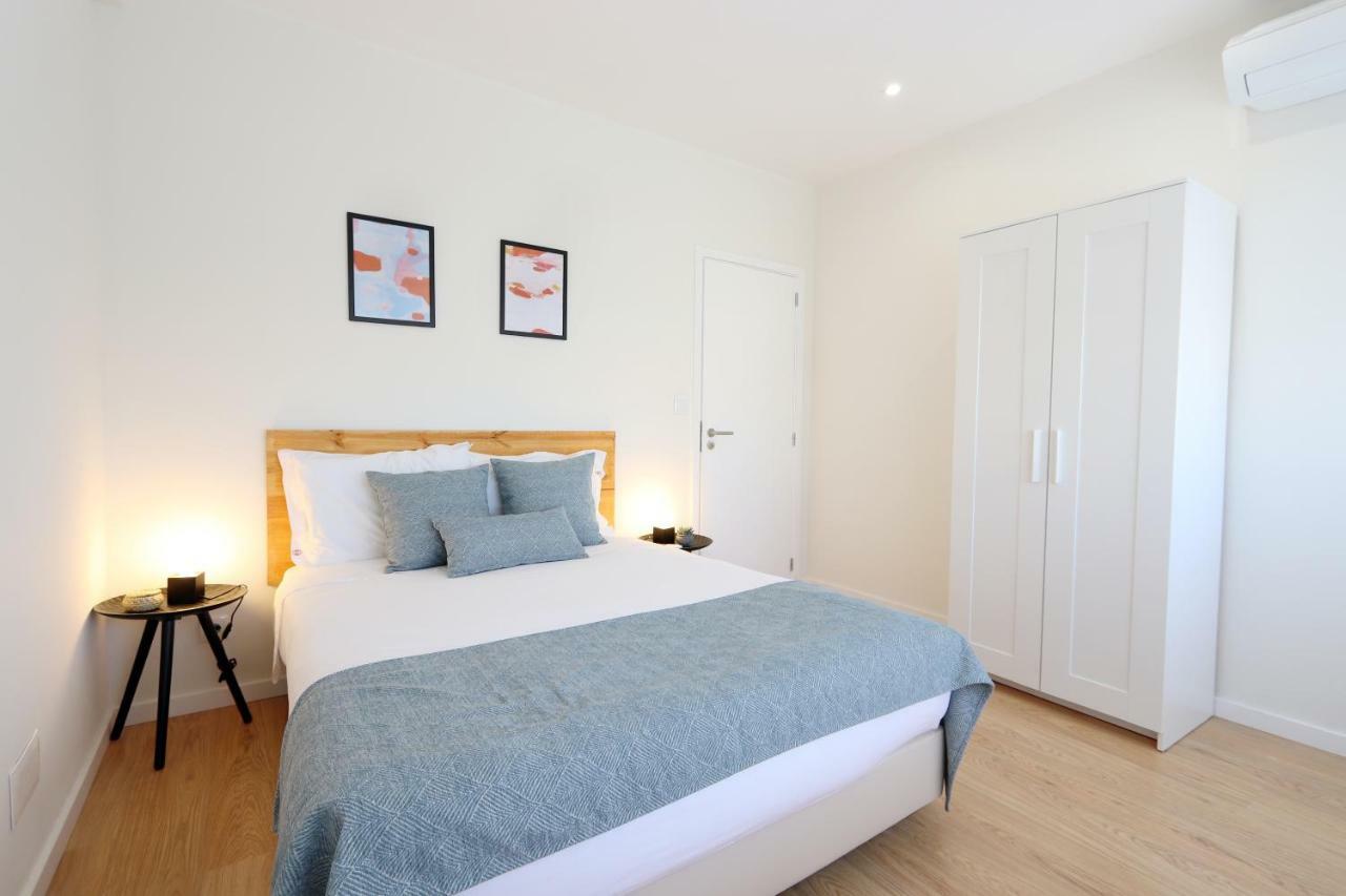 HM - Living Batalha Square 2 Apartment Porto Bagian luar foto
