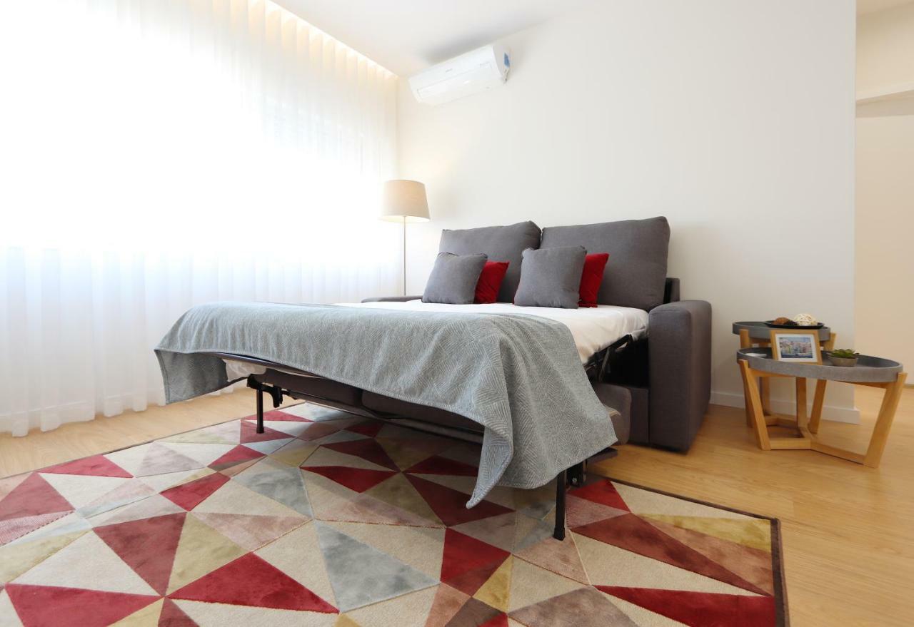 HM - Living Batalha Square 2 Apartment Porto Bagian luar foto